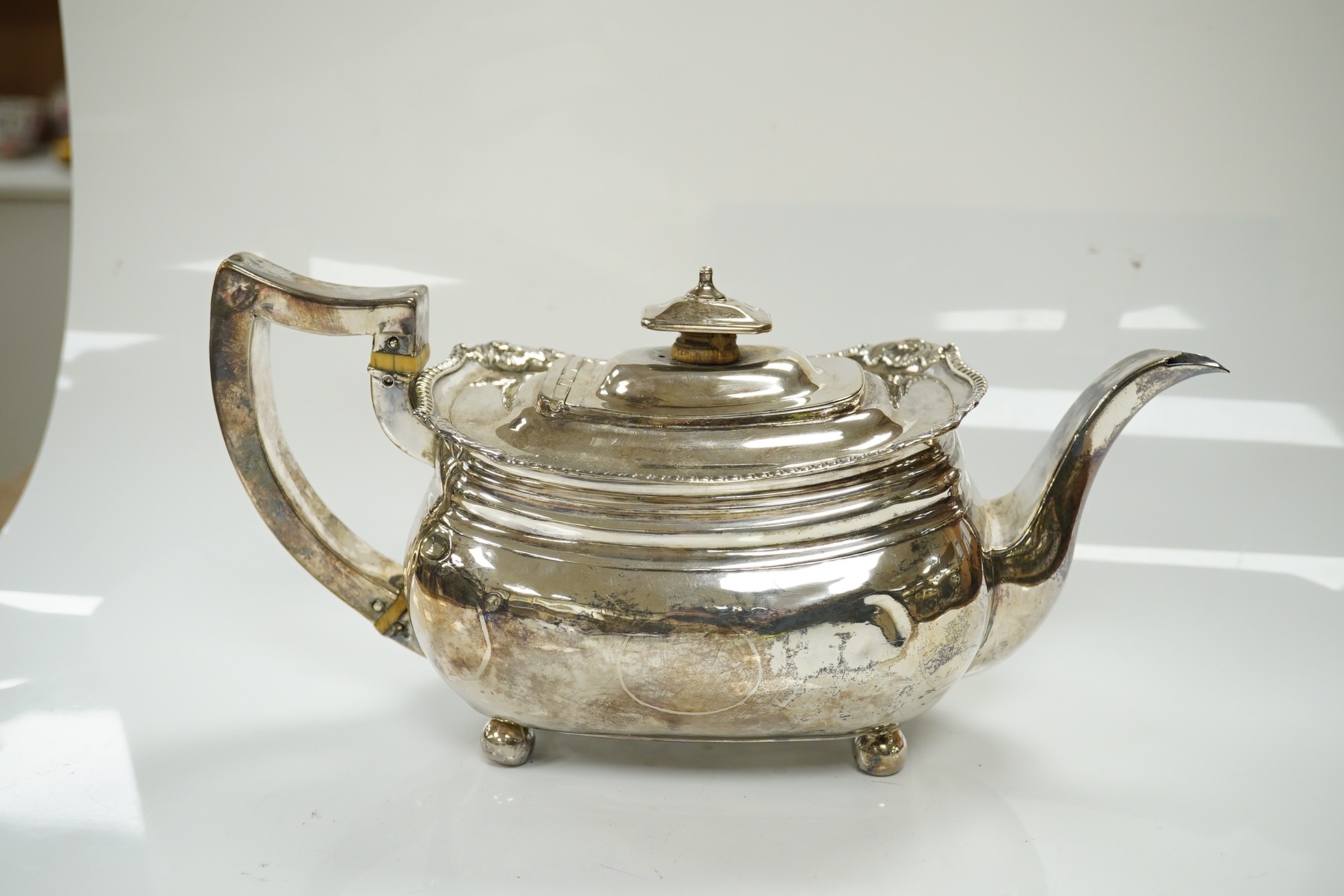 A George III silver teapot, Charles Chesterman II, London, 1810, gross weight 17.9oz. CITES Submission reference 85XWF6ED. Condition - poor